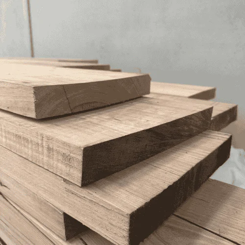 Kiln-drying reduces timber moisture to a stable level suited for structural use.